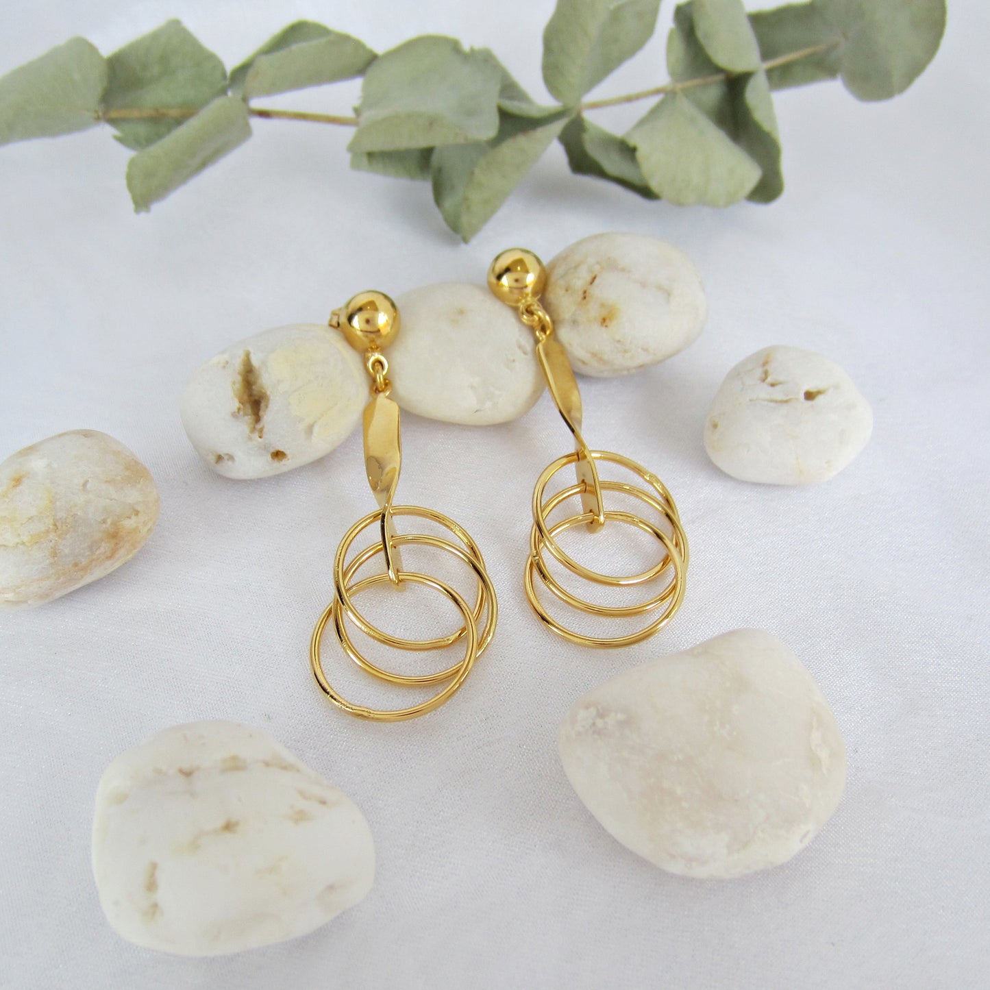 Arete Dorado círculos Entrelazados