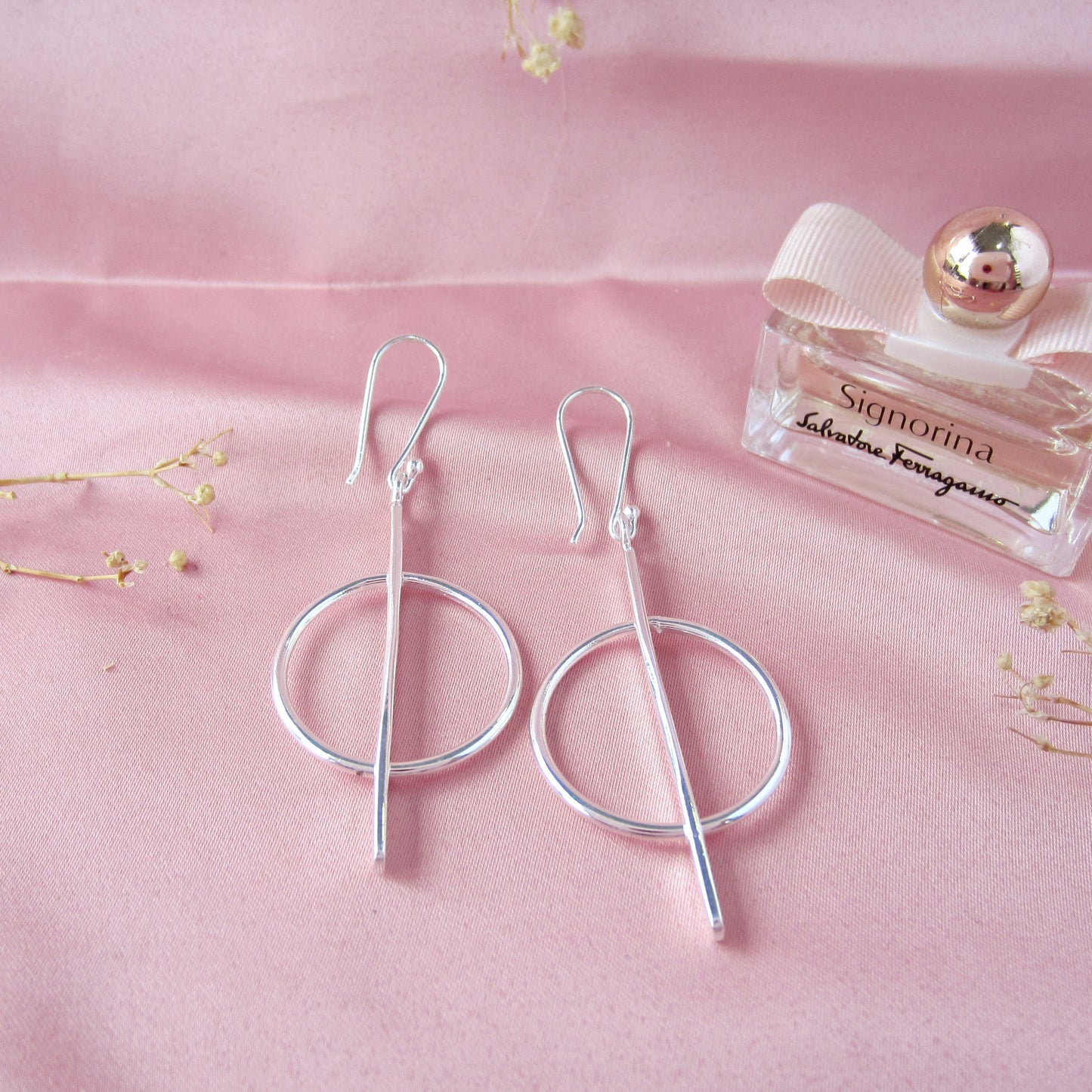 Aretes Plateados Balance