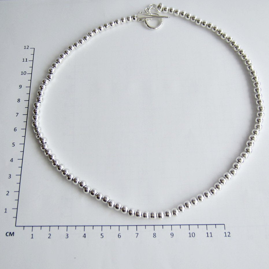 Collar Bolitas Petit