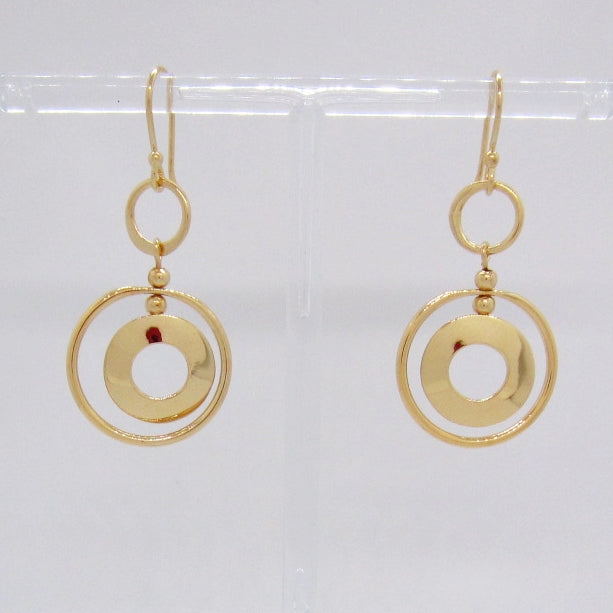 Arete Dorado Círculos en Movimiento