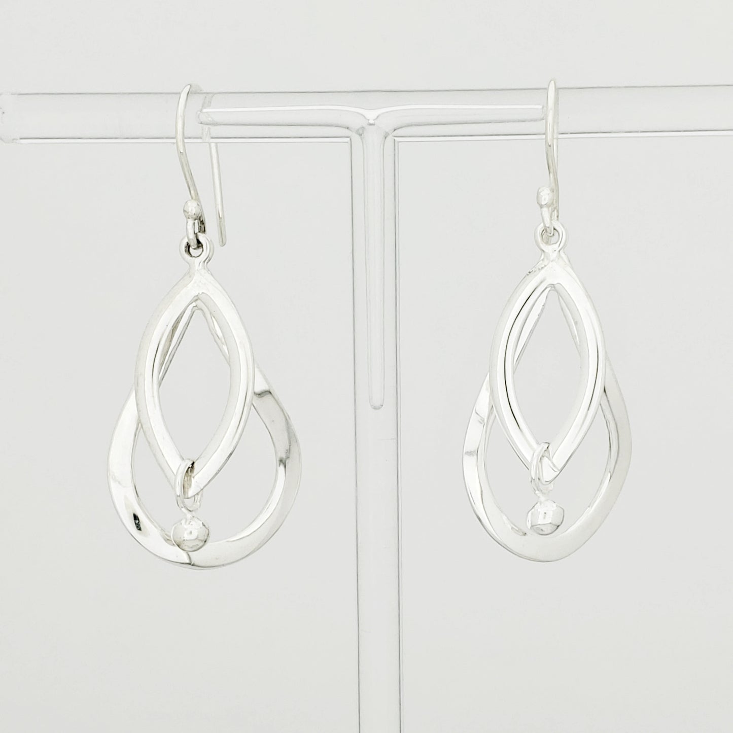 Arete Plateado Doble Silueta