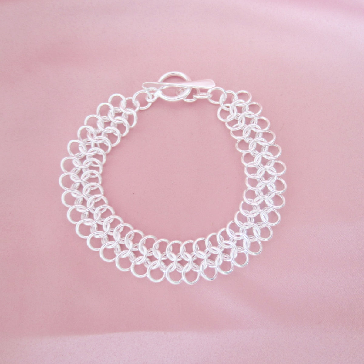 Pulsera plateada gusano plano