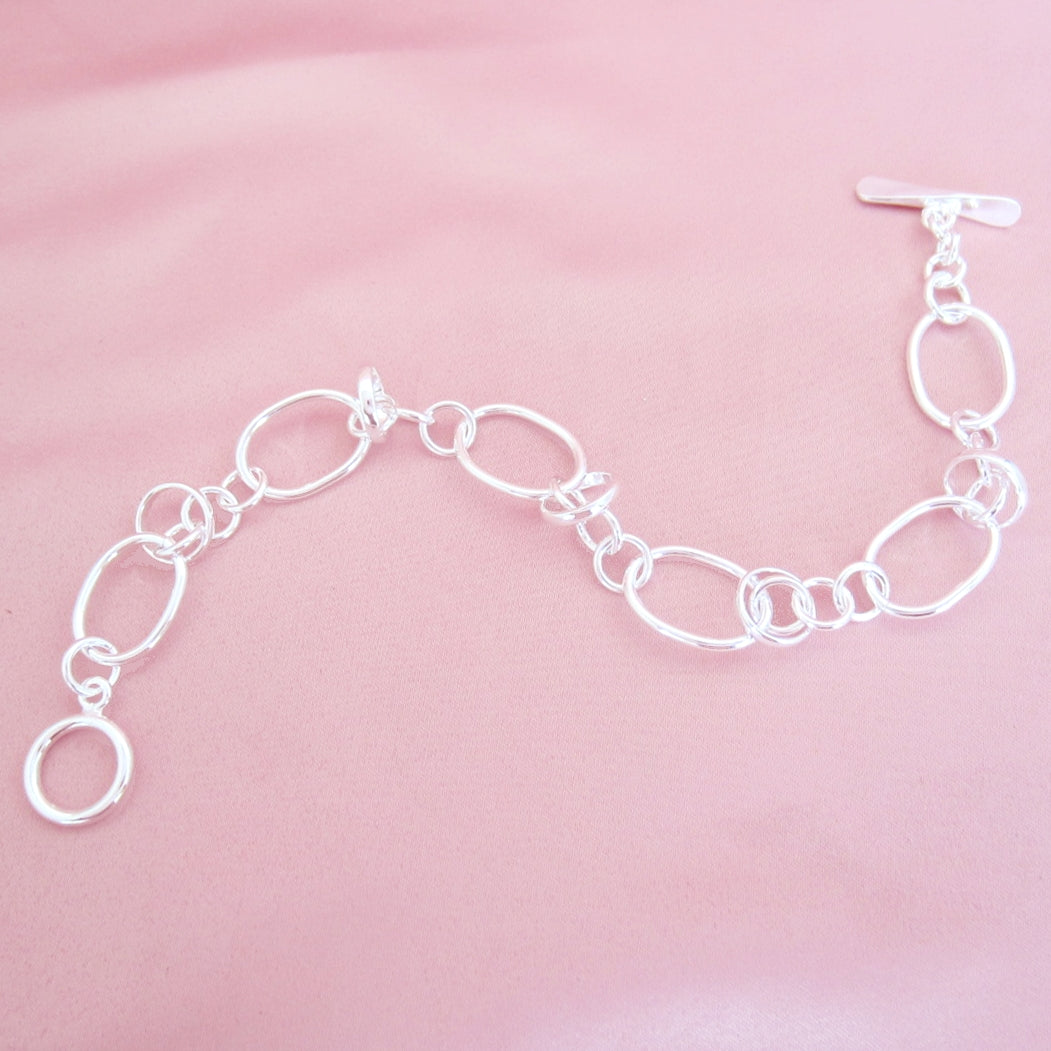 Pulsera Plateada Ovalos caña