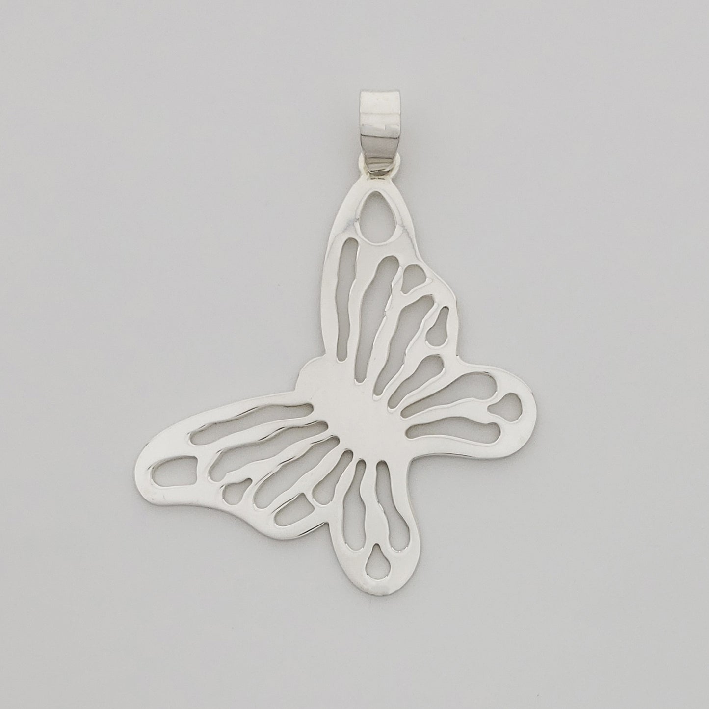 Dije Mariposa Volando