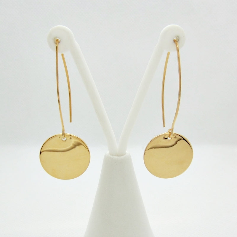 Aretes almendra y medallita