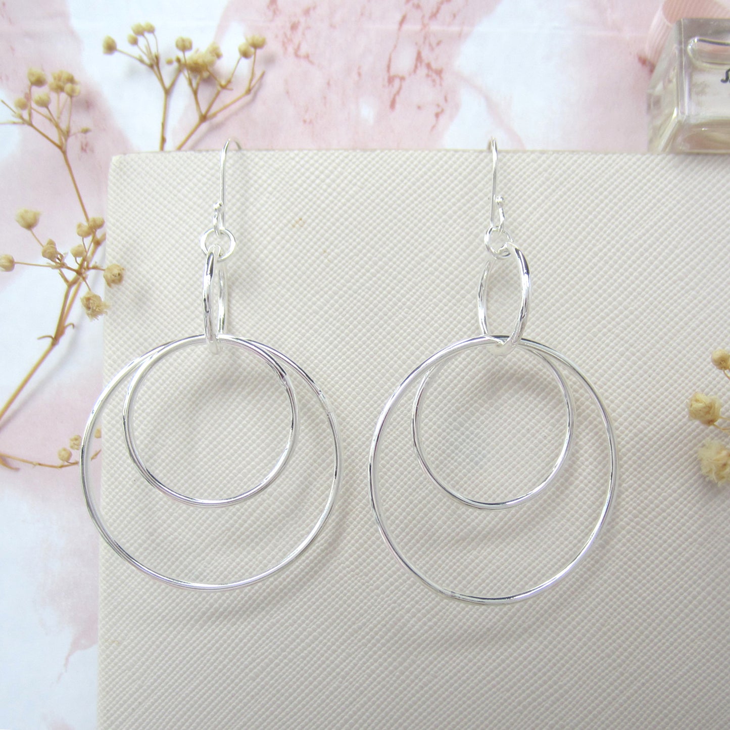 Arete plateado aros lisos