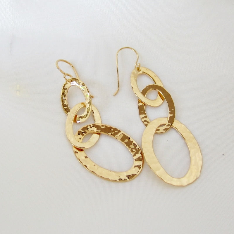 Three oval earrings