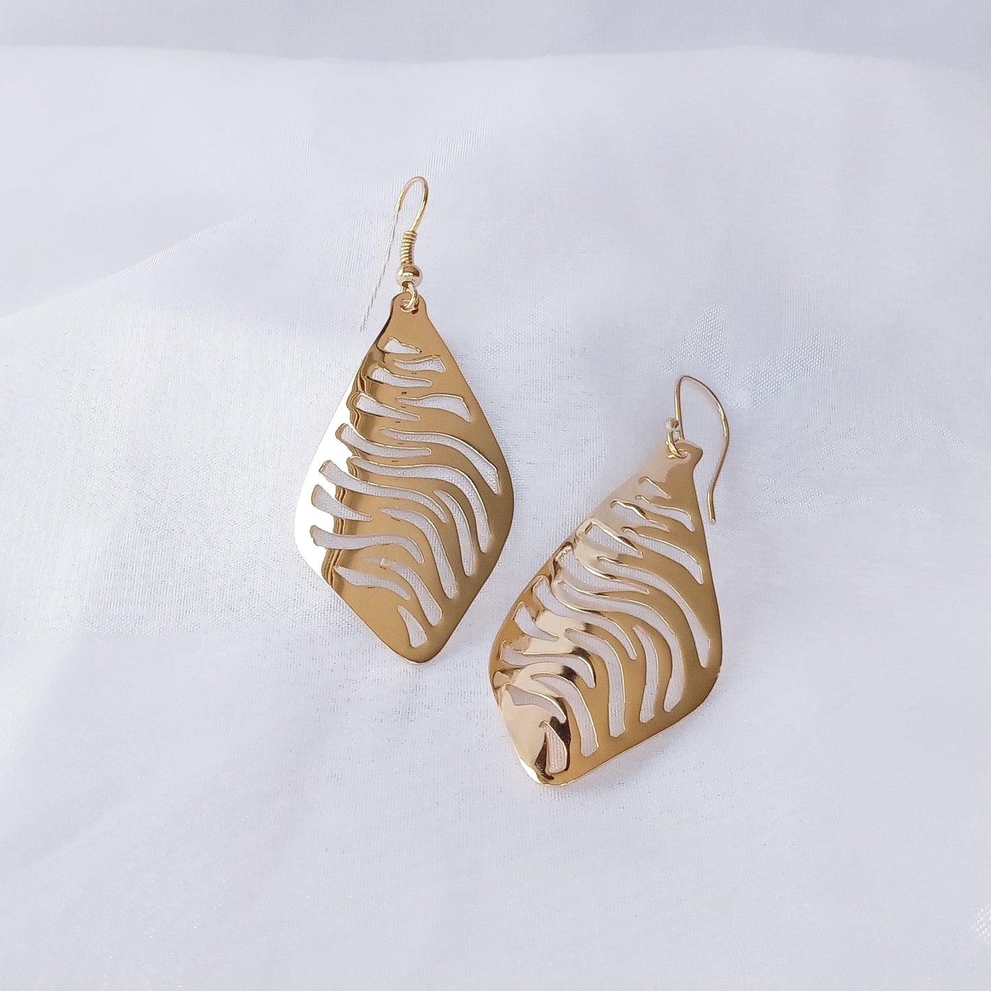 Arete Dorado Cebra