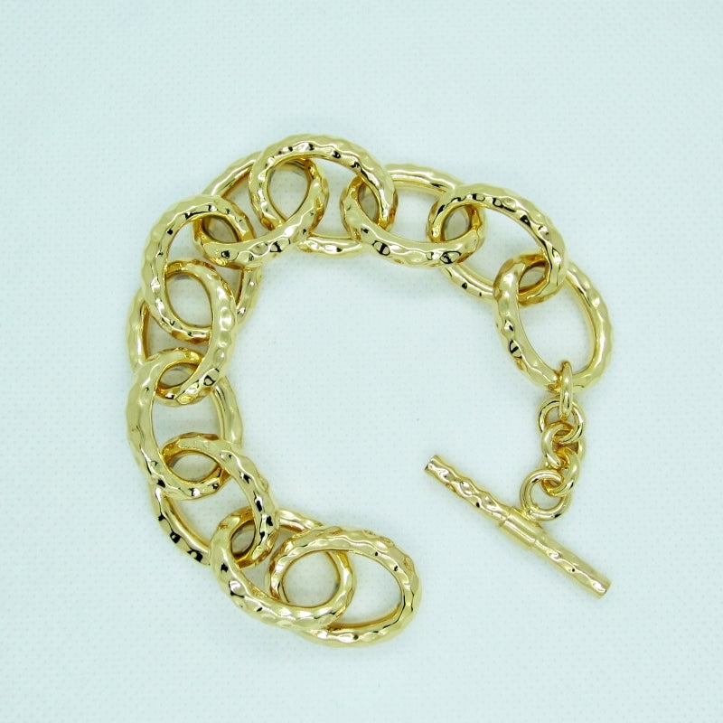 Pulsera dorada de tubo