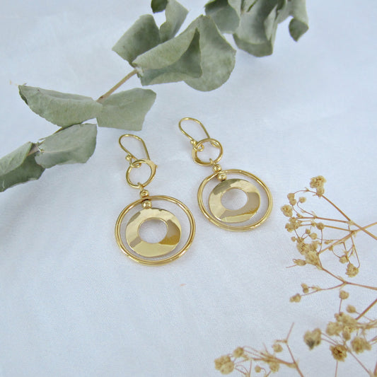 Arete Dorado Círculos en Movimiento