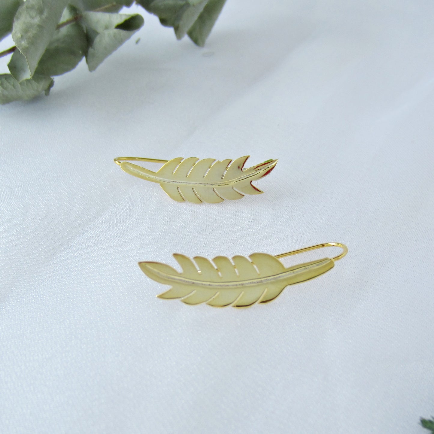 Aretes dorados pluma india