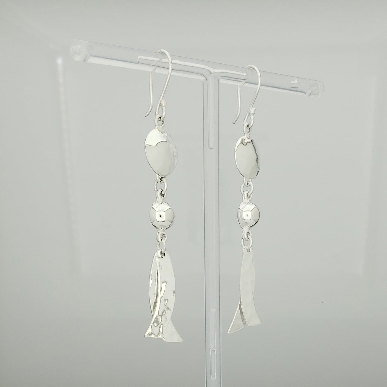 Arete plateado listones