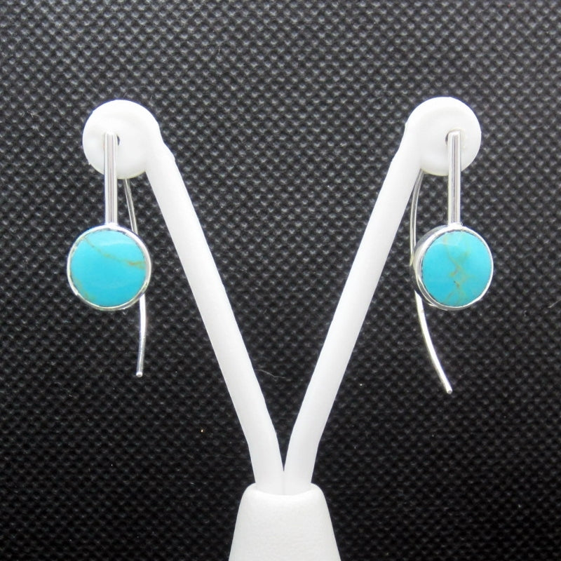 Aretes plateados lupa