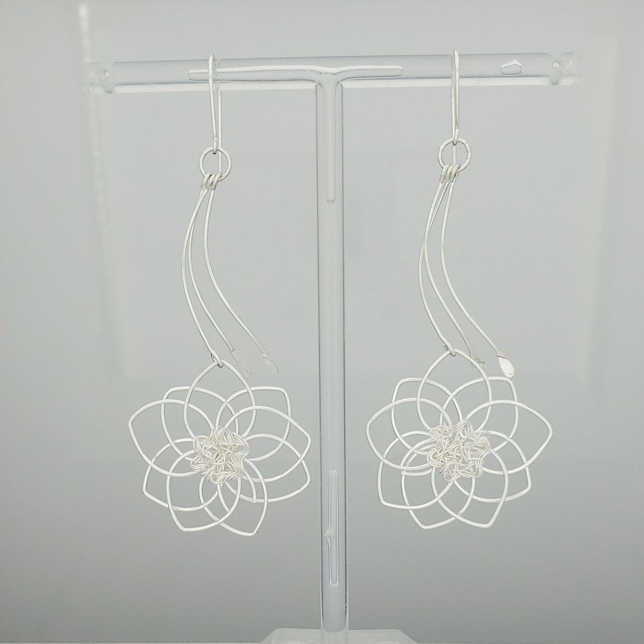 Arete plateado flor de loto