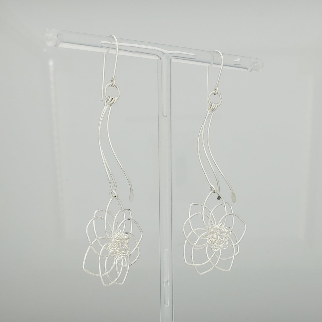 Arete plateado flor de loto