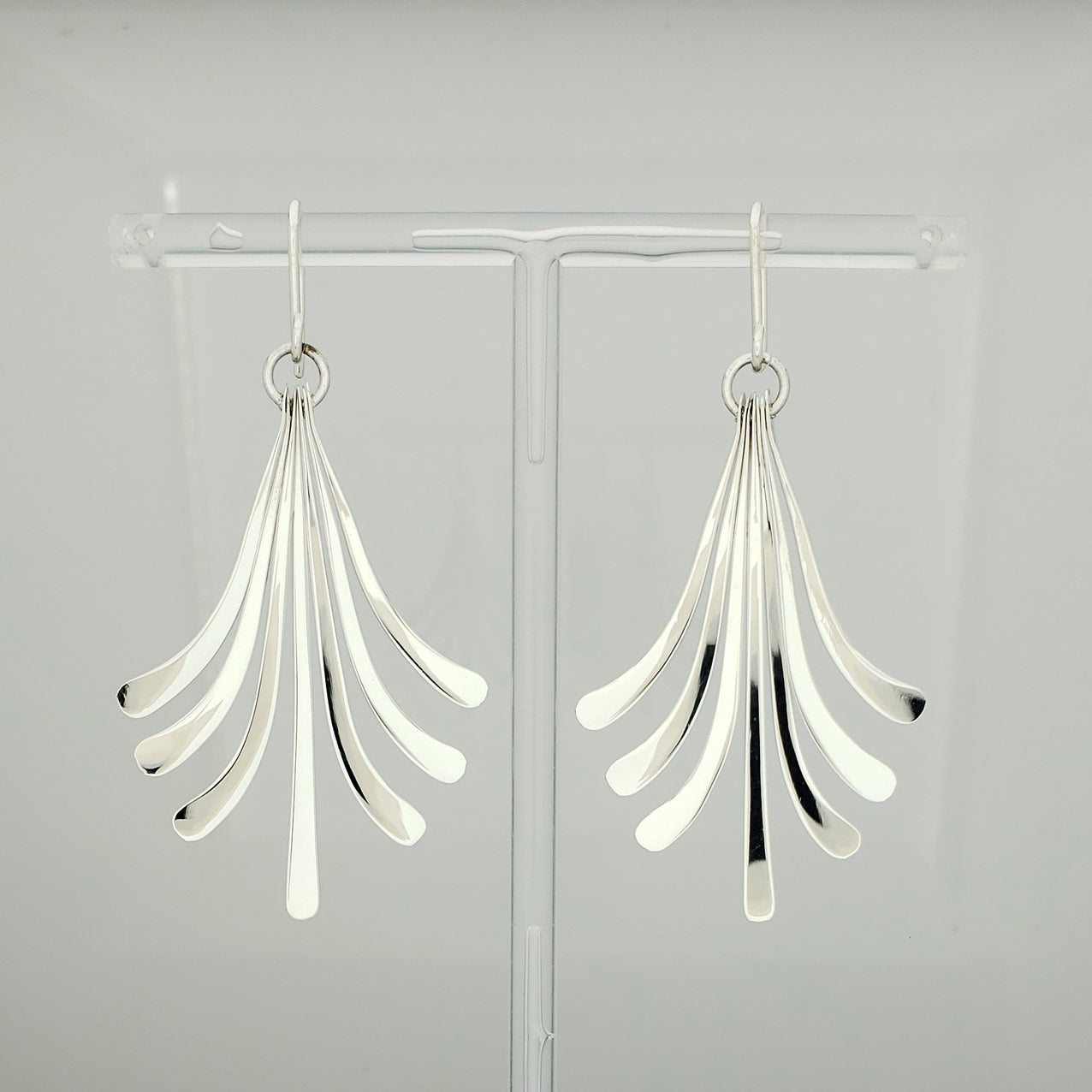 Arete plateado abanico maxi