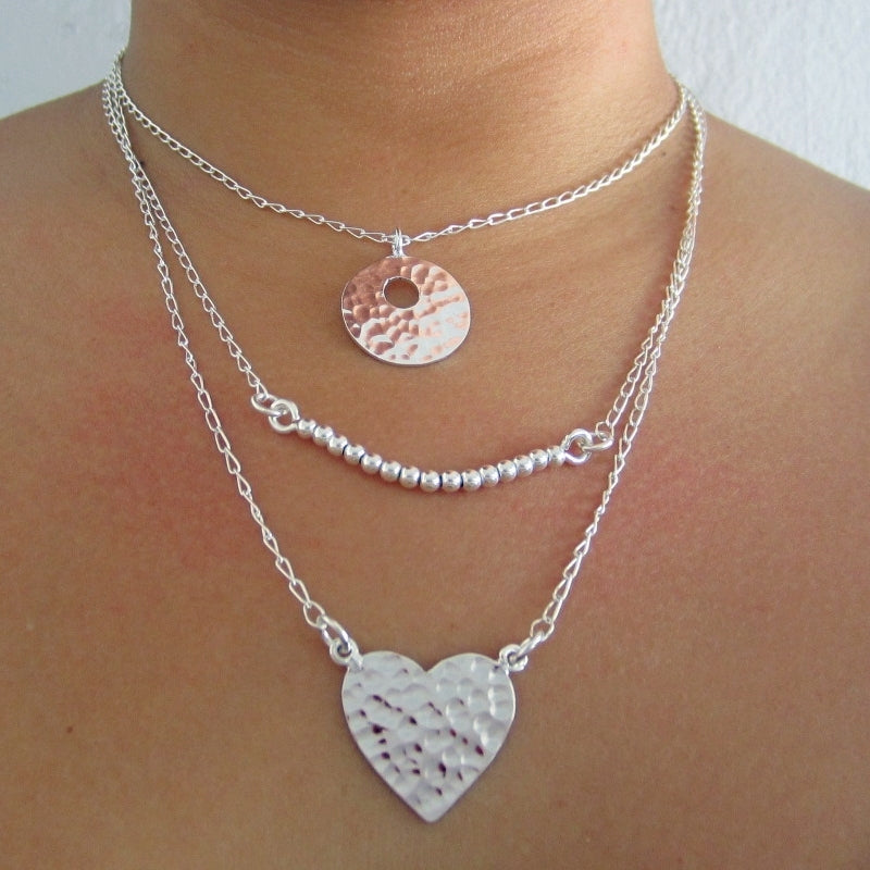 Collar plateado triple