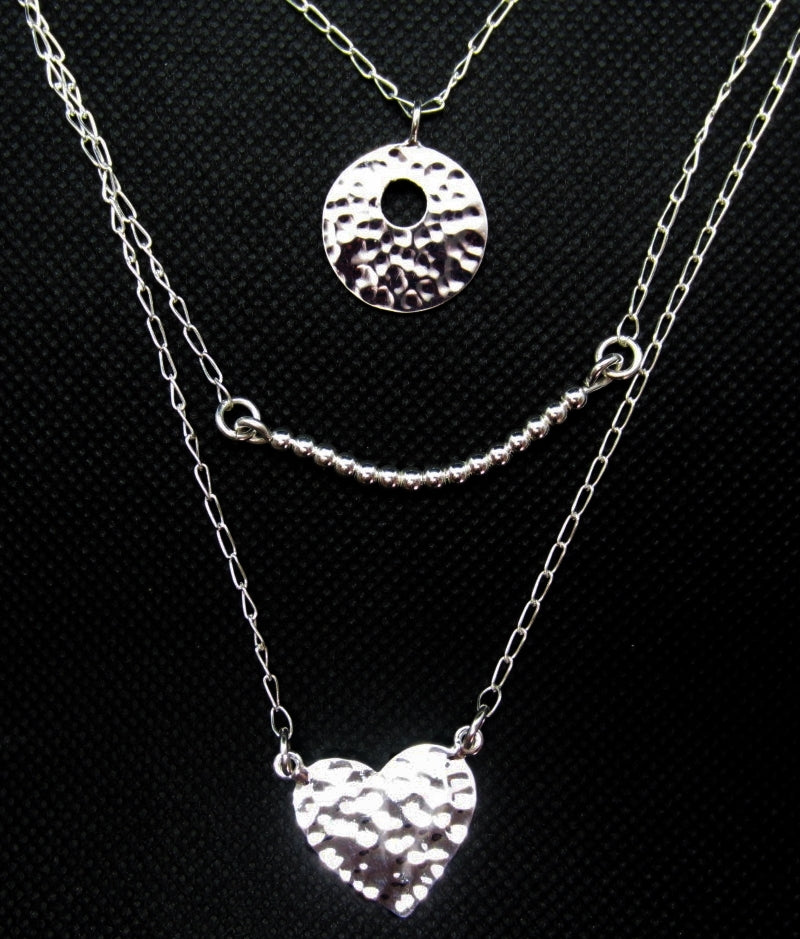 Collar plateado triple