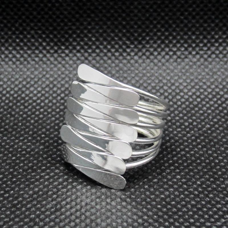 Anillo plateado dedos - Petick Joyería Artesanal