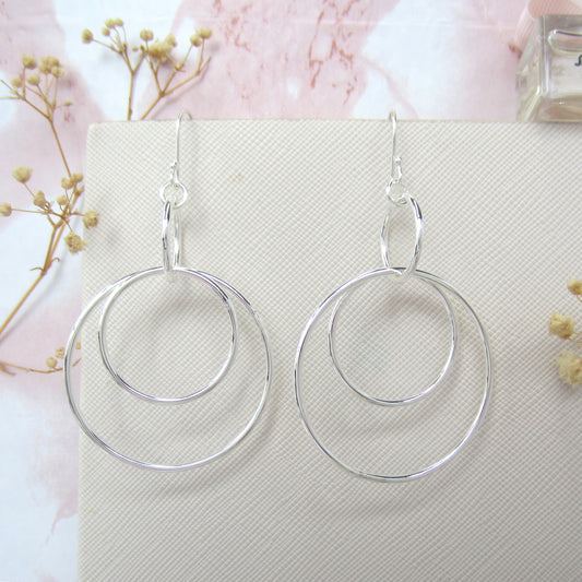 Arete plateado aros lisos