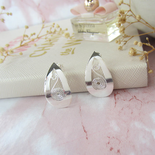 Arete plateado gota chinos