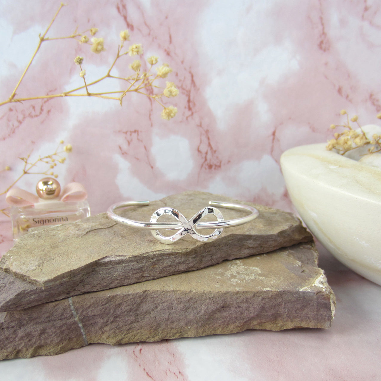 Brazalete plateado infinito alambre