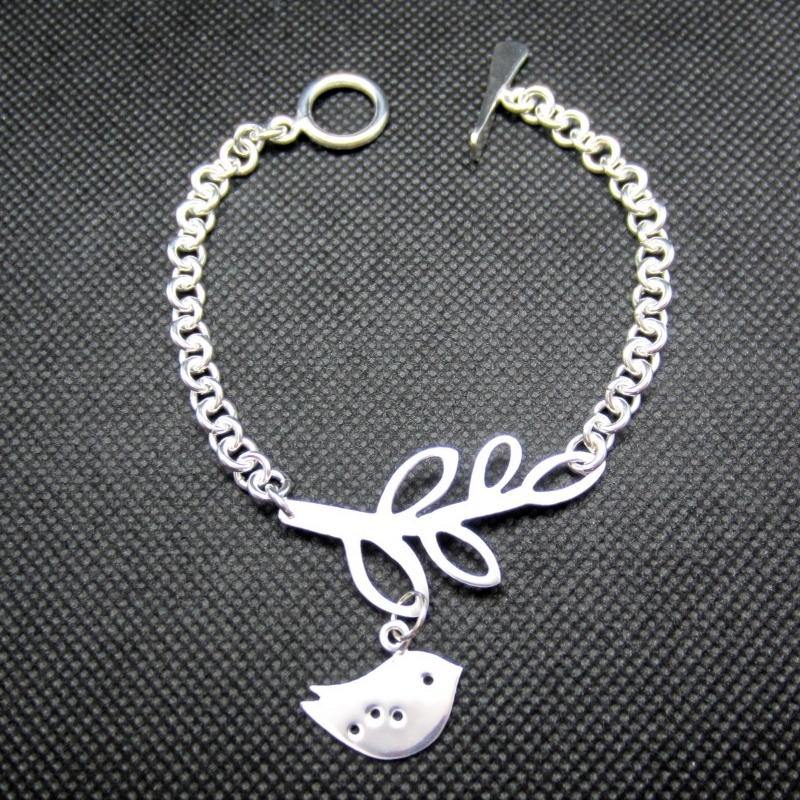 PULSERA PLATEADA RAMA Y PAJARITO - Petick Joyería Artesanal