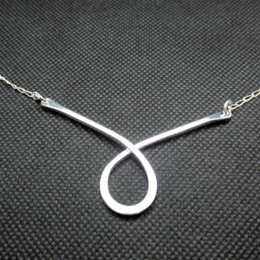 COLLAR PLATEADO TRAPECISTA - Petick Joyería Artesanal
